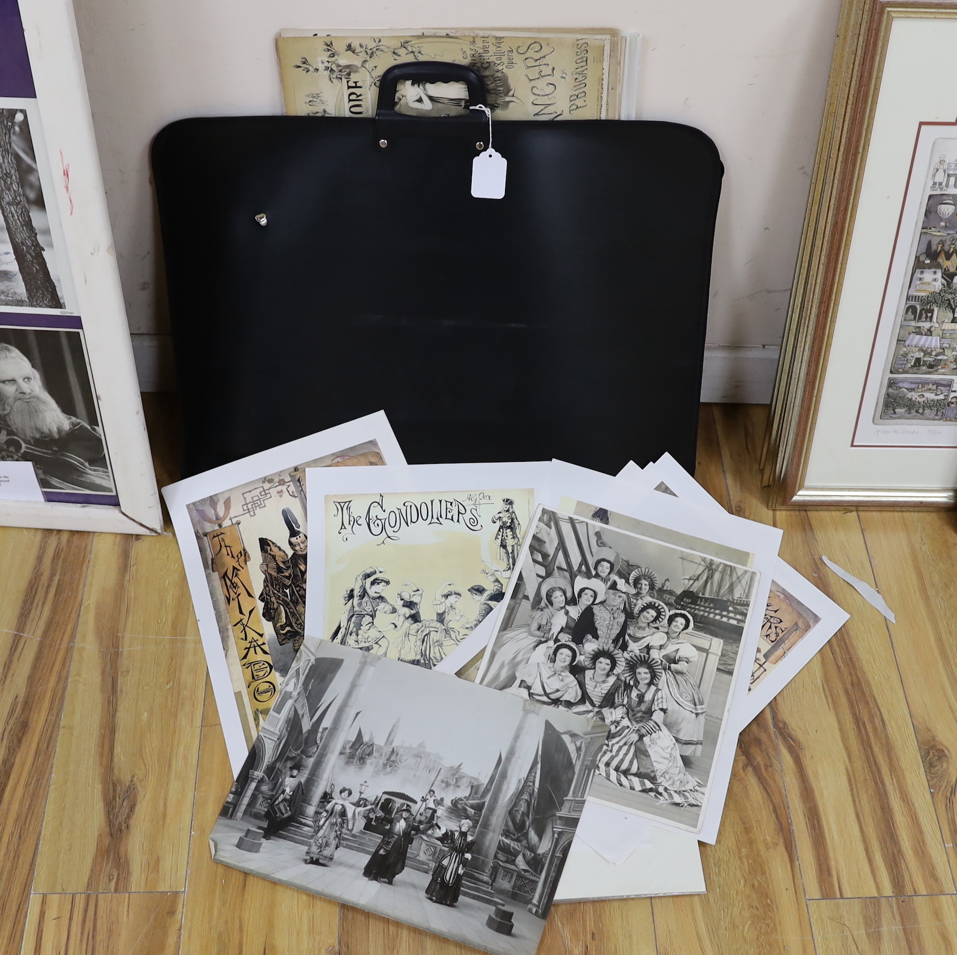 An early 20th century lithograph poster for Gilbert & Sullivan’s H.M.S. Pinafore, in an oak frame, together with a framed play bill, another framed poster, a large framed production photograph and a framed photo montage
